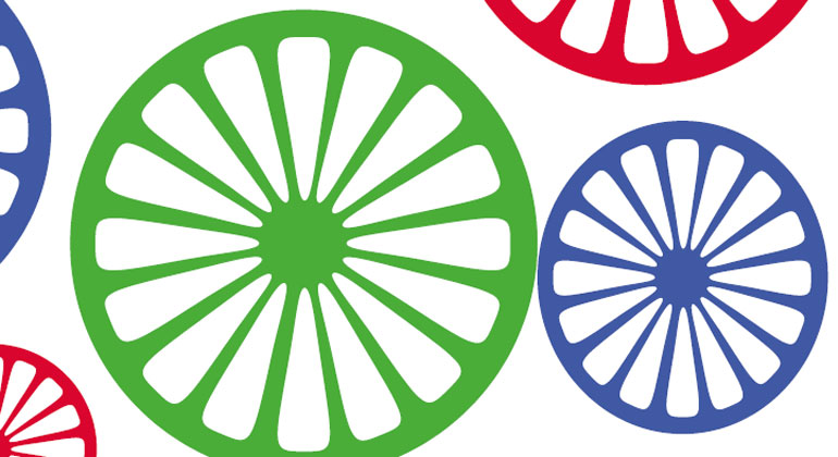 Romska hjul i grönt, blått och rött.